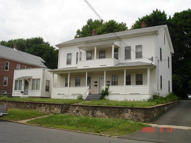 It is the little house on left