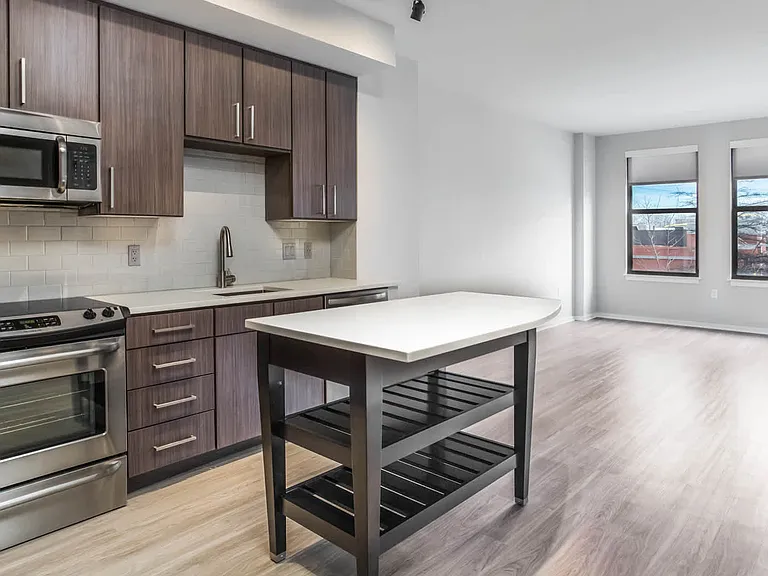 Kitchen and Living Room with Hardwood Flooring