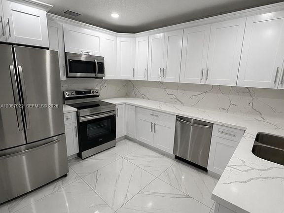 3rd image of 552 NE 161st St