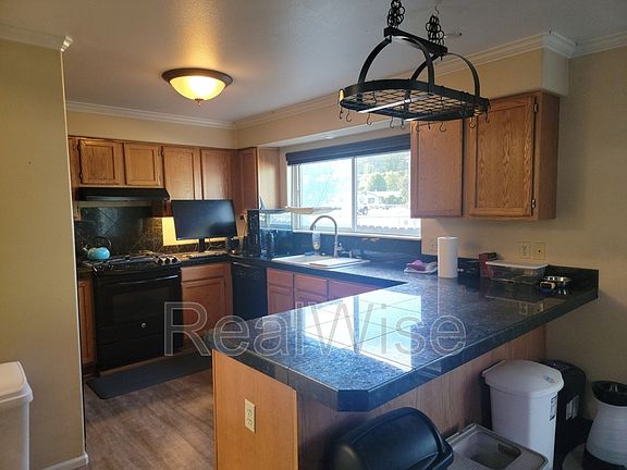 2nd image of 172 NE Rifle Range St APT 9
