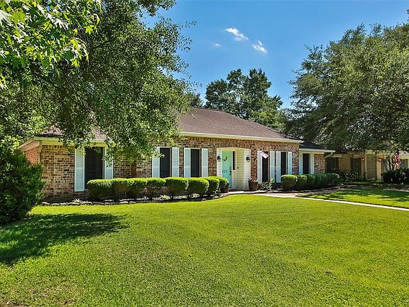 Nestled on a quiet cul-de-sac street with mature landscaping.