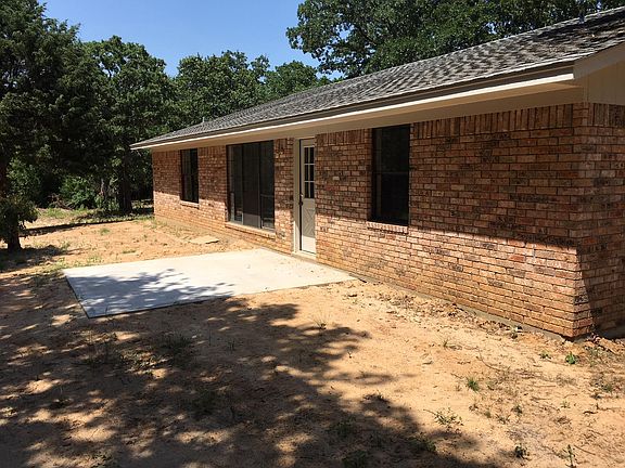 Back of Home - New Concrete Patio