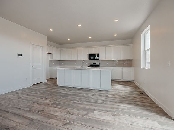 3rd image of 322 E Clear Granite Way