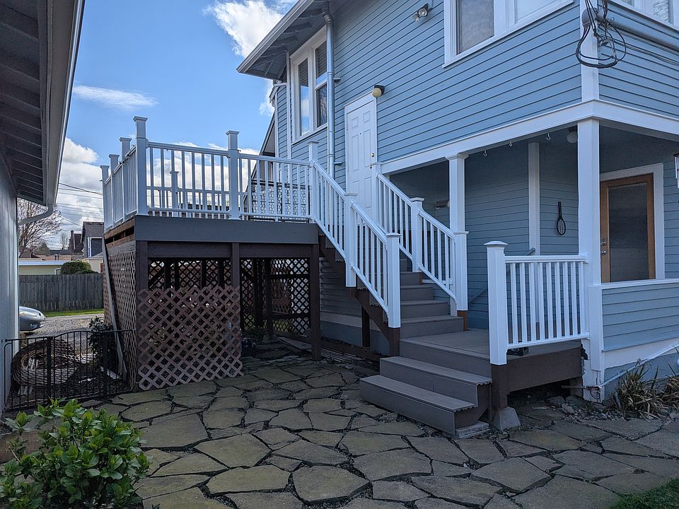 Back entrance with new deck (2025).
