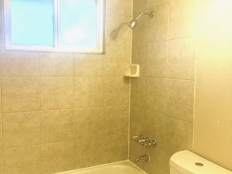Bathroom with tile shower