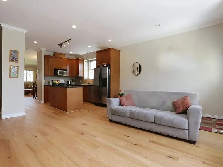 Open kitchen and Family room with back door access to the backyard.