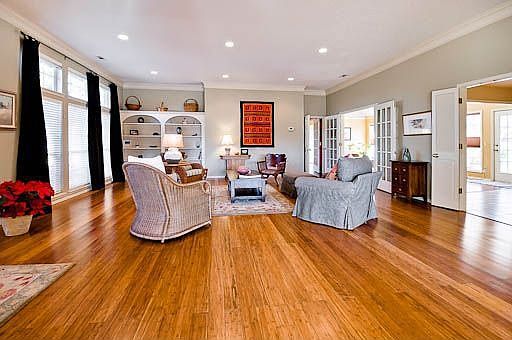 Built-in shelving, custom window treatments
