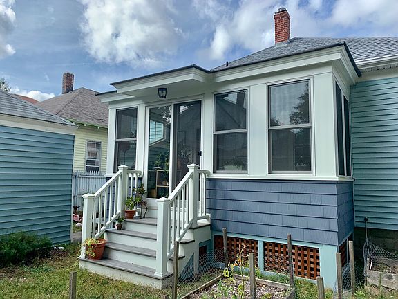 Sun room leads to backyard