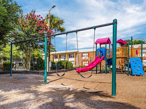 Children's playground with swing set and play set