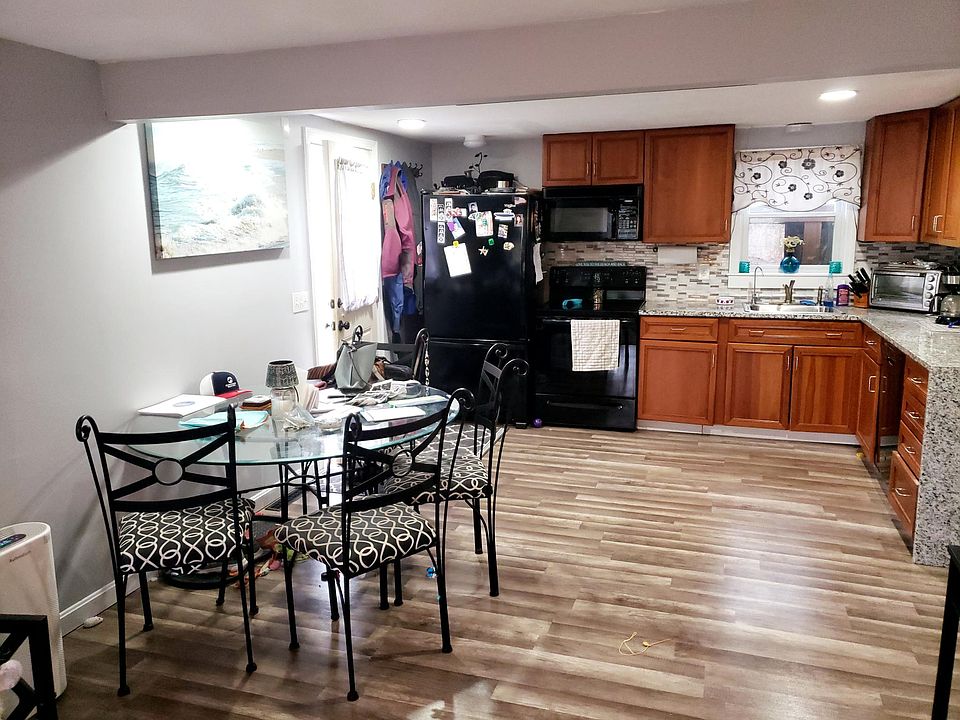 Kitchen with granite counter tops.