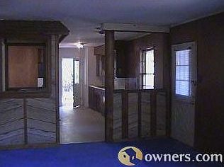Livingroom to front door & kitchen.