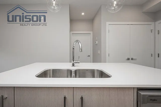 265 Wolf Willow Blvd SE #2115 — Photo 16