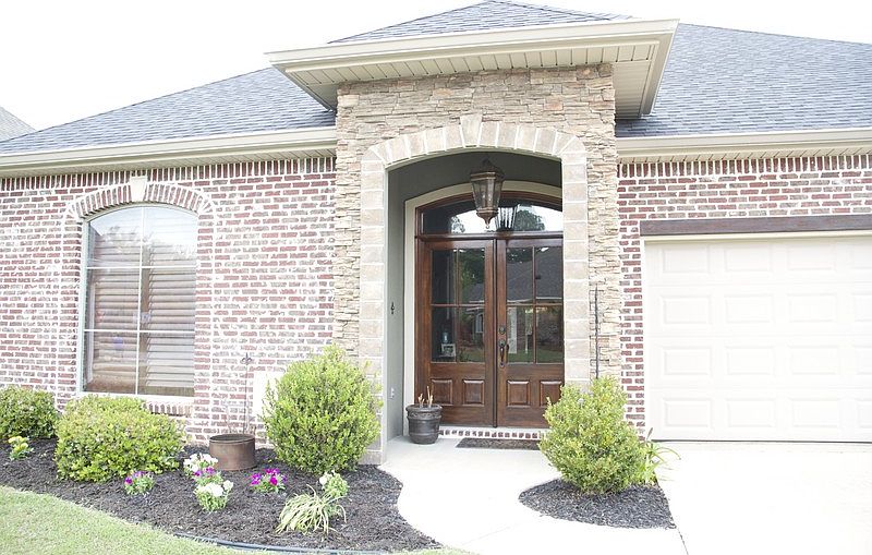 Front Entry
						:
						Gorgeous stone entry with double wooden doors