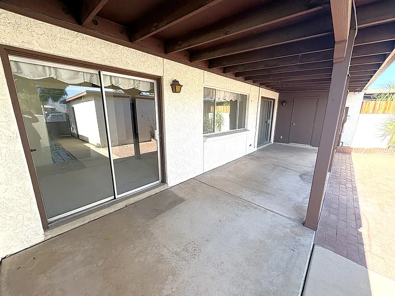 Covered patio faces north