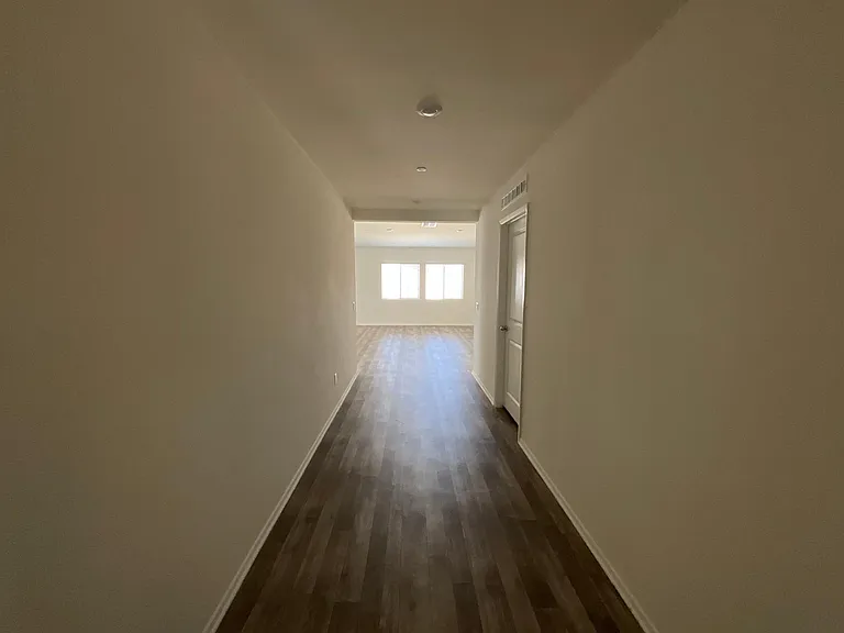 Hallway entry 2 bedroom on left and bath and mater on right off living room