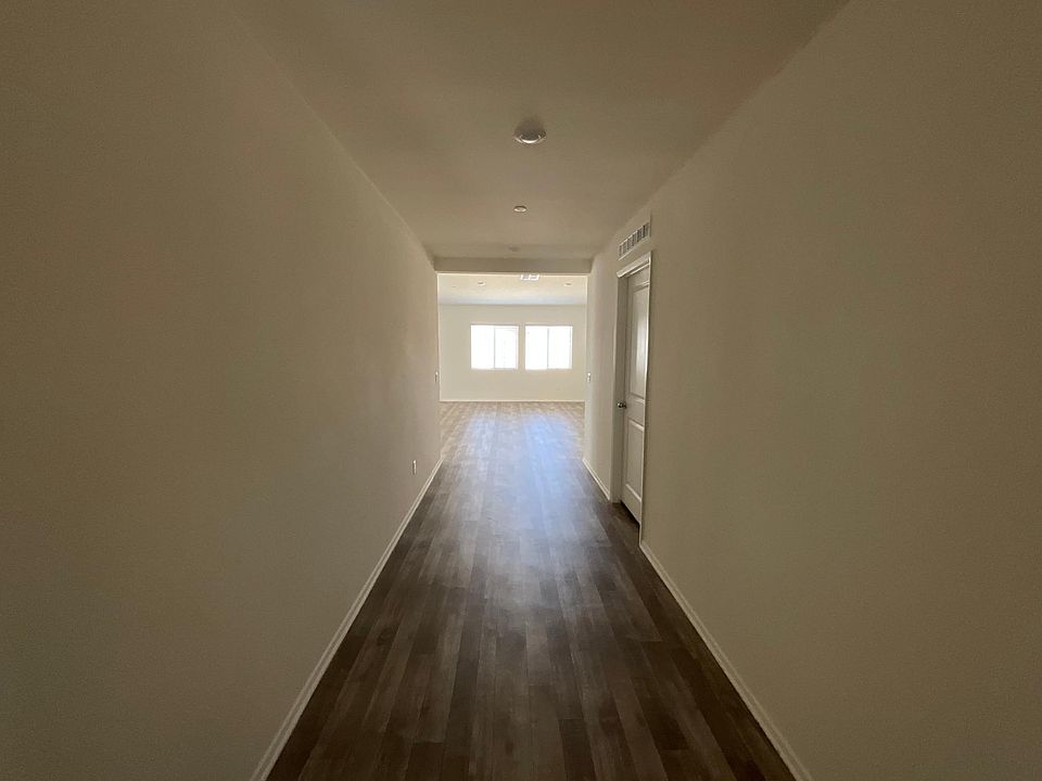 Hallway entry 2 bedroom on left and bath and mater on right off living room
