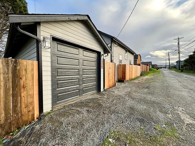 Plenty of space to park your extra vehicle if you decide to park in the back alley