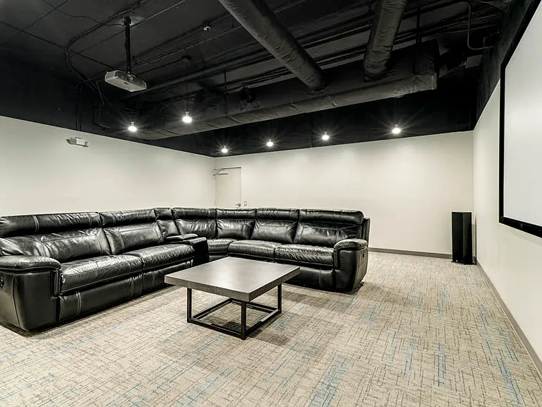 Kick up your feet and watch your favorite flick in our movie theater room.