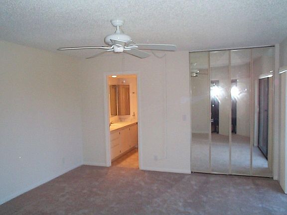 Master bedroom with walk-in closet...