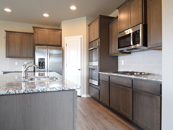 Kitchen with stainless steal appliances and granite countertops
