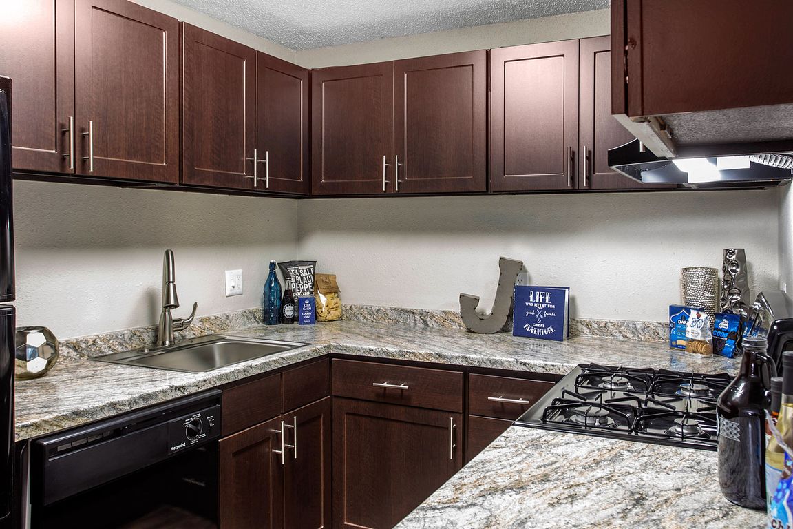 Experience culinary delight in this sophisticated kitchen, perfect for the discerning chef.
