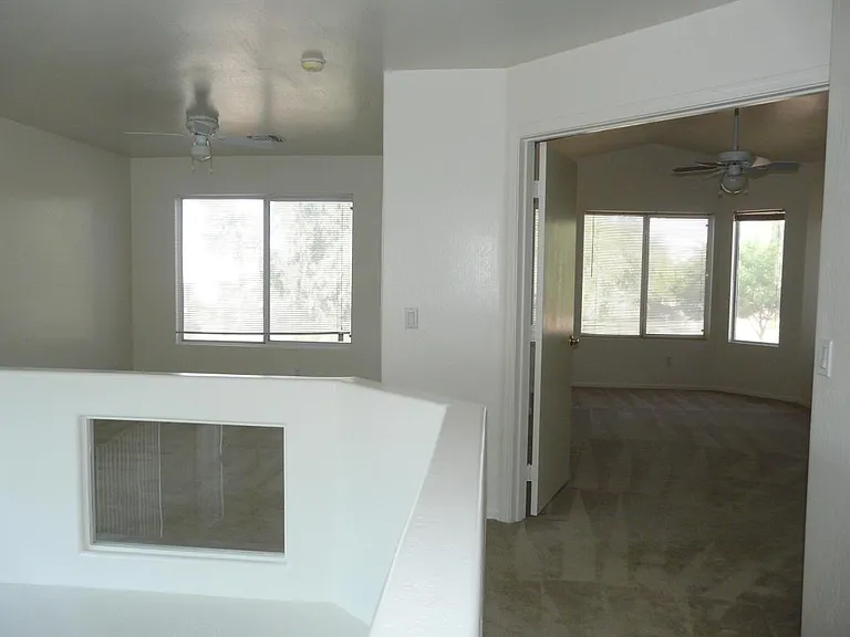 the open loft area (left)
master bedroom and Bathroom (right)
with views to the green Park