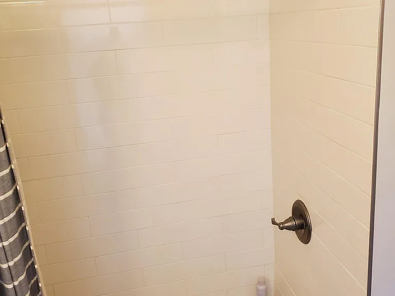 Subway tile shower with tub