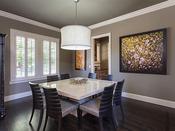 Spacious formal dining room with butlers pantry access.