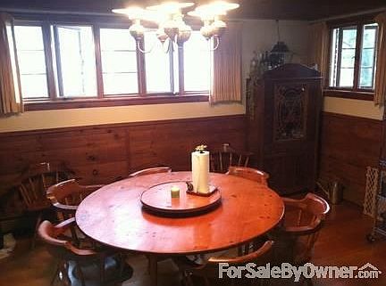 Dining room
						:
						Table and chairs can stay with the home. They were built to match this room.