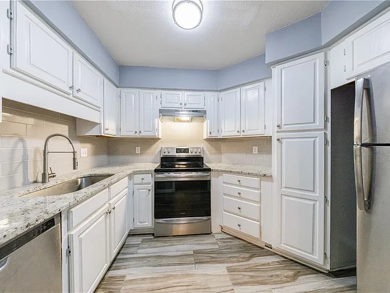 27306 Plantation Dr NE #306 — Photo 38