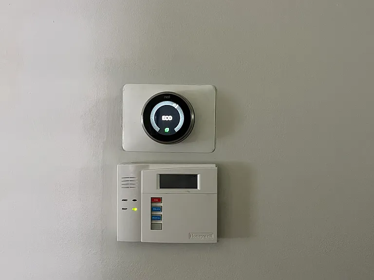 Nest Thermostat and EMC Security panel
