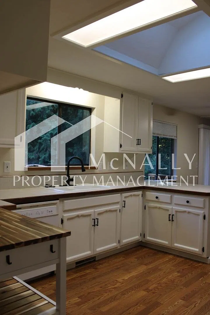 3-Bedroom Home with Wood-Burning Fireplace & Attached 2-Car Garage — Photo 3