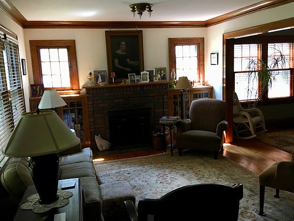 fireplace with oak bookcase