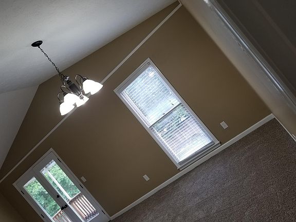 Living room with french doors on to balcony