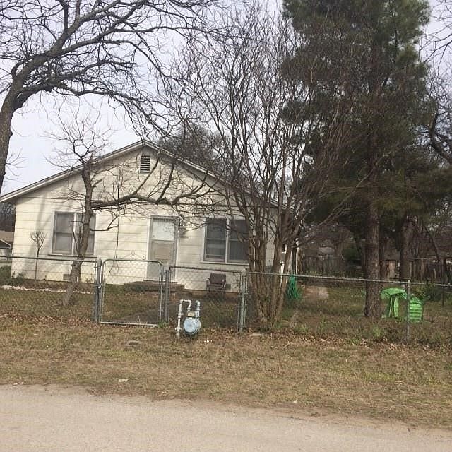 Property has a side yard and back yard