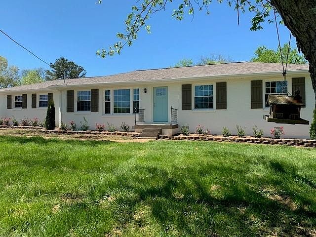 One Level Ranch Set Back On A One acre Lot, Up A Long Driveway.