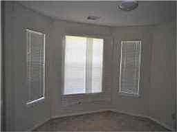 VERY APPEALING BEDROOM #3 WITH BAY WINDOW.