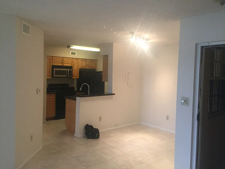 2880 N Oakland Forest Dr #110 — Photo 9