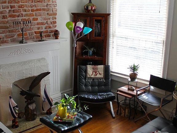 Living Room with Fireplace and Huge Window