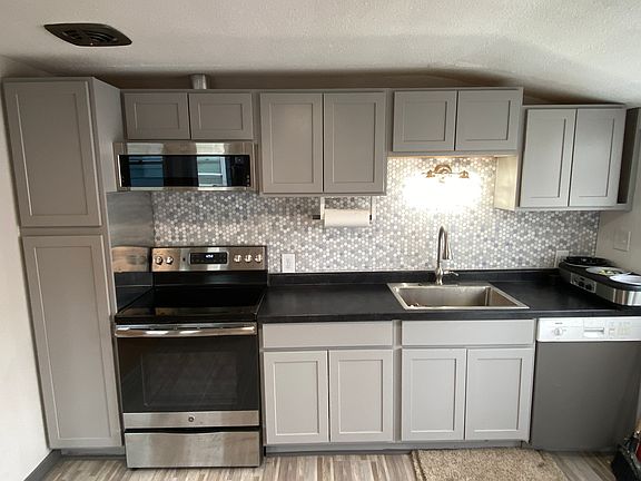Dishwasher and Stove included