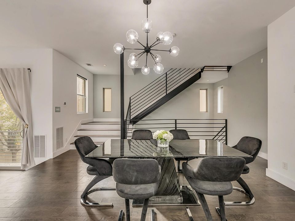Exquisite marble table in the dining room can easily accommodate the group for a gourmet meal.