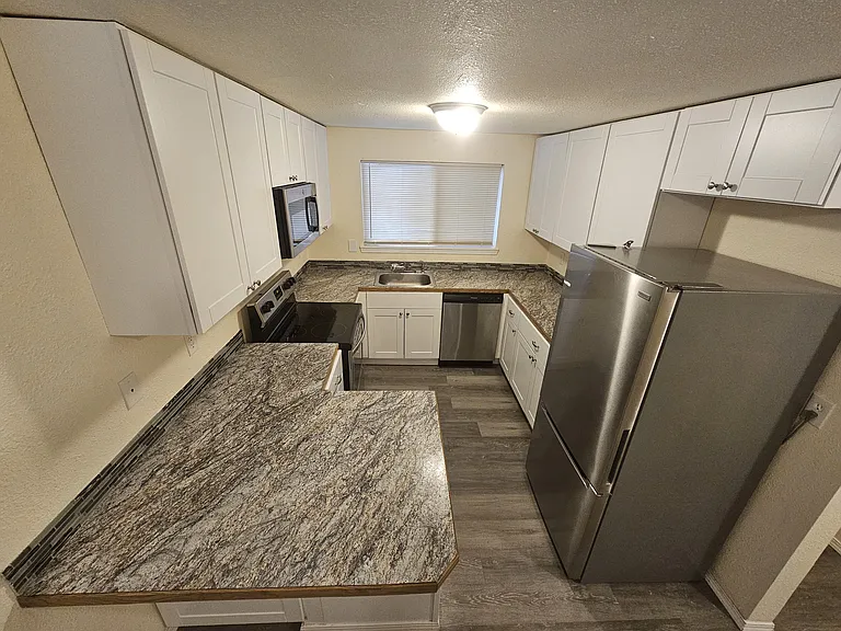 665 Sunset Ave NE #100 — Photo 1