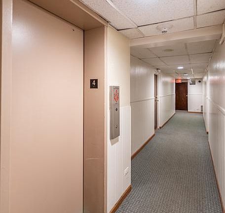 Hallway leading to unit from Elevator