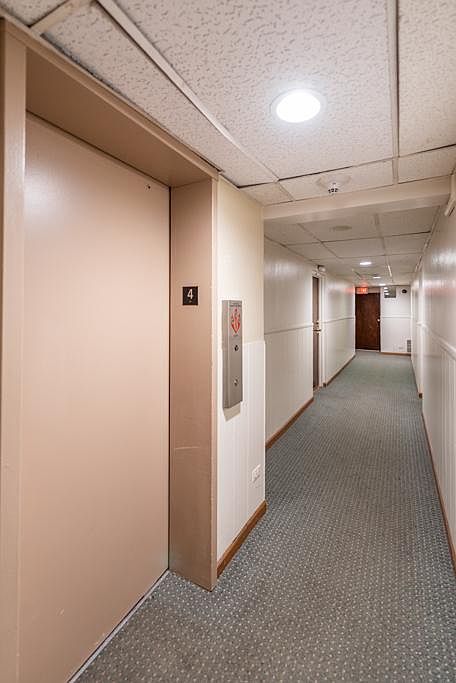 Hallway leading to unit from Elevator