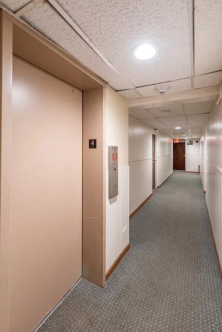 Hallway leading to unit from Elevator