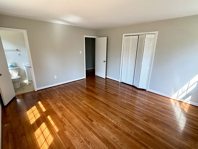 Generous primary suite with two closets and a private full bath.
