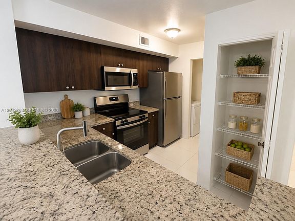 5th image of 11177 SW 8th St APT 208