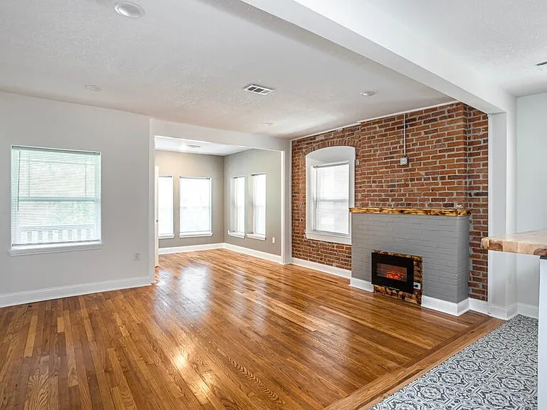 Living room with exposed brick