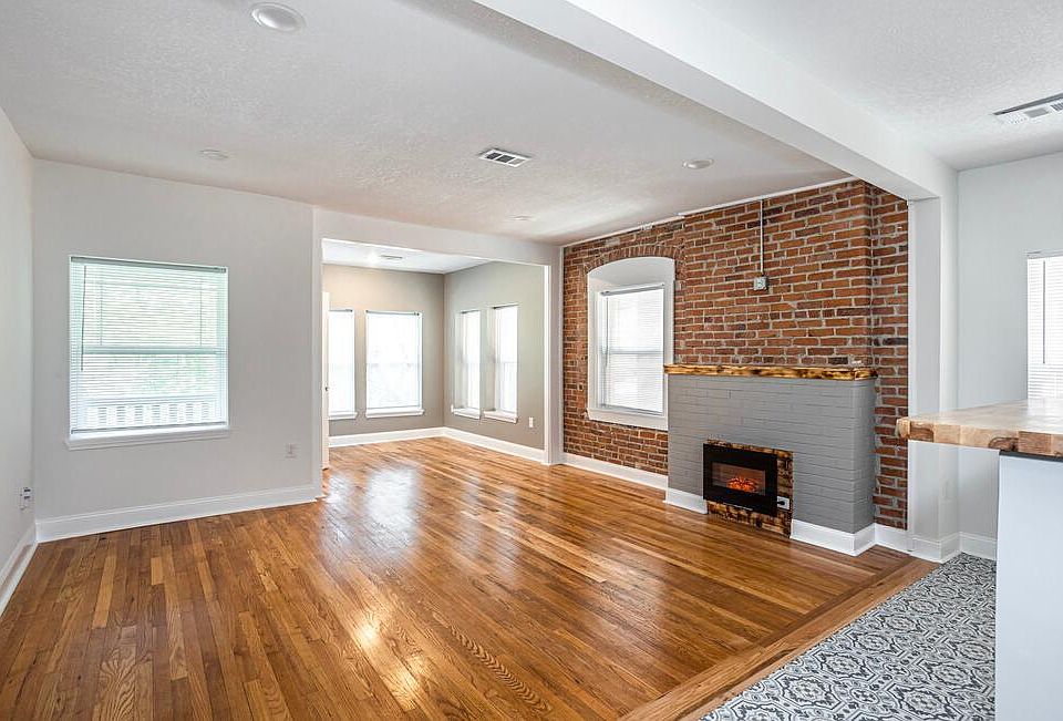 Living room with exposed brick