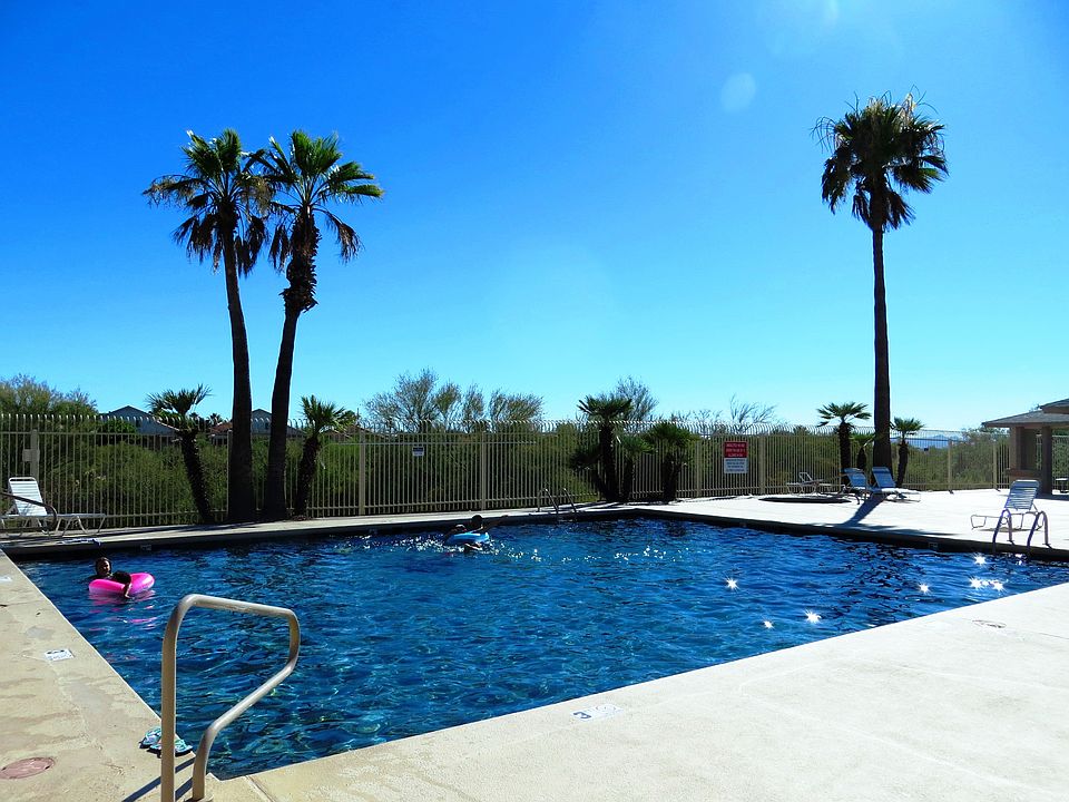 Poolside/open lands behind